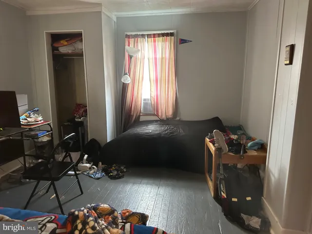 a room with furniture and a window