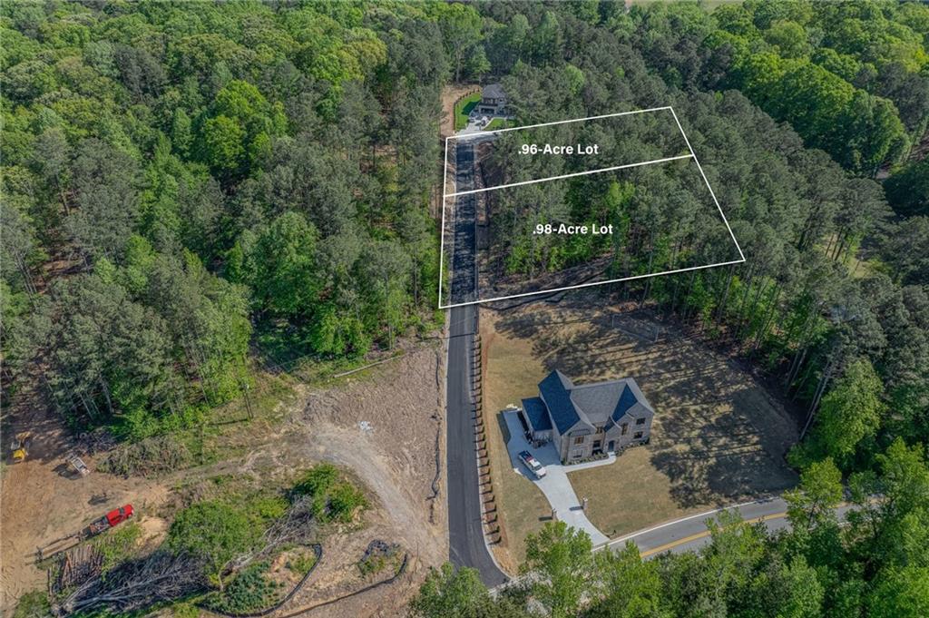 1559 Whitley Road Dacula, GA 30019 - Photo 11 of 34 an aerial view of residential house with outdoor space