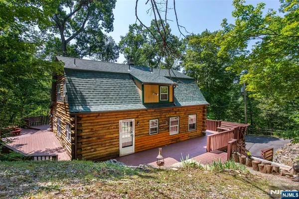 a view of a chairs setting on the deck