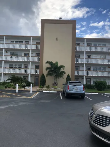 a view of street with parked cars
