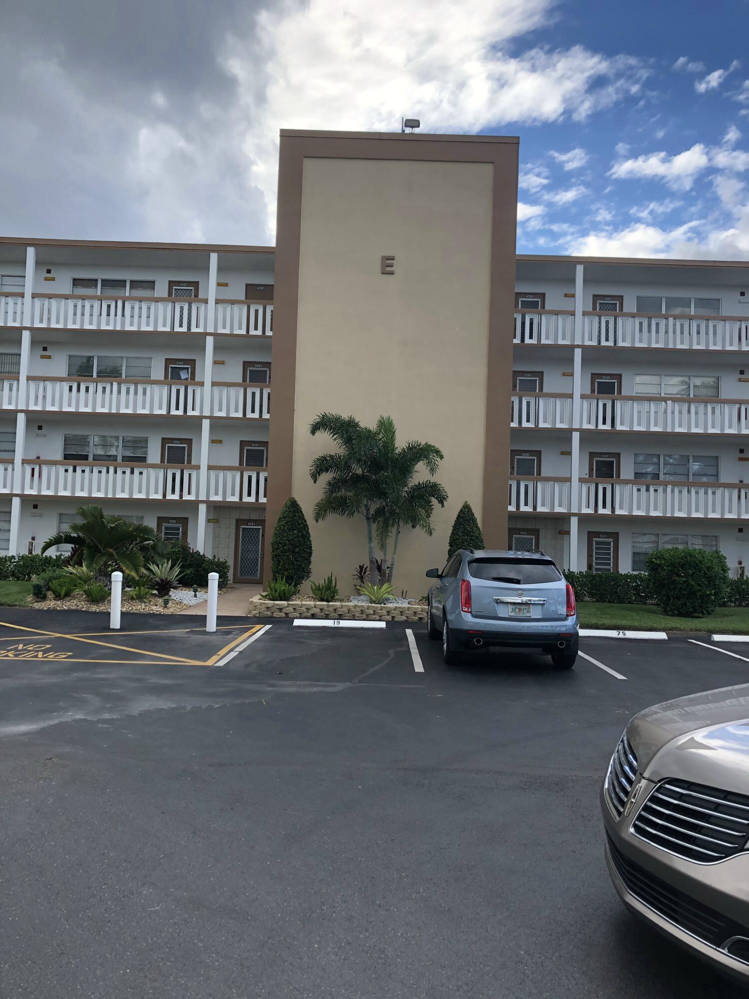 3085 Cornwall East Boca Raton, FL 33434 - Photo 9 of 12 a view of street with parked cars