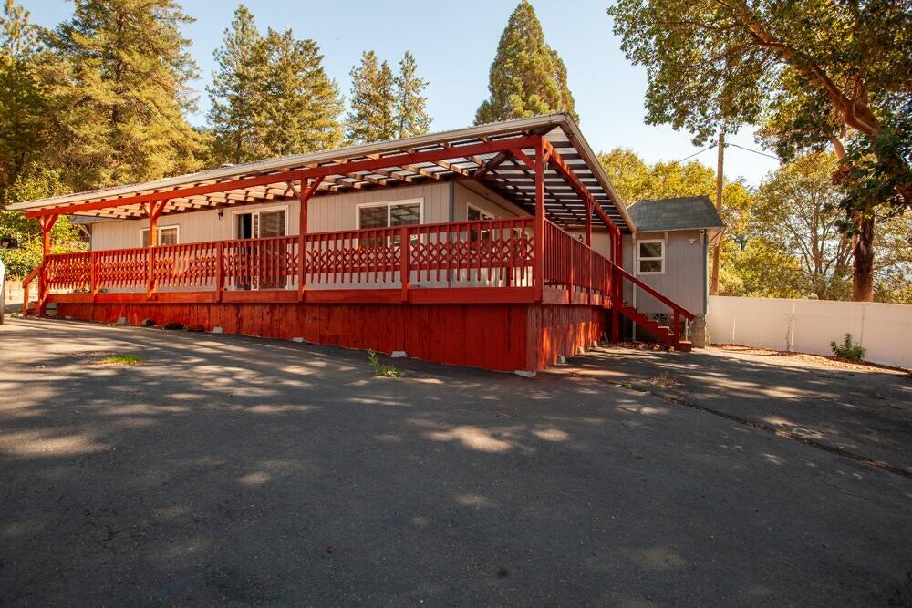 4778 North River Road Gold Hill, OR 97525 - Photo 9 of 15 a large building with a street