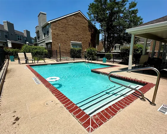 a view of a house with a yard patio and a patio