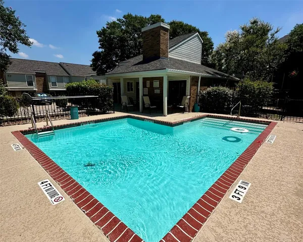 a view of a house with a yard patio and a patio