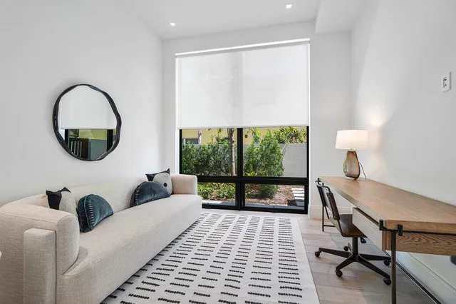 a living room with a couch and a table