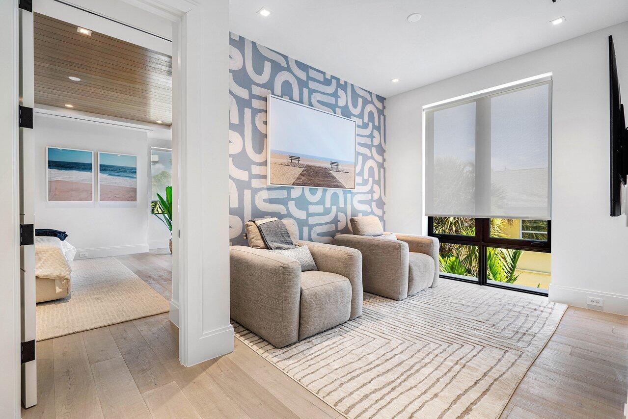 514 Northeast 7th Avenue Delray Beach, FL 33483 - Photo 18 of 51 a living room with furniture and a table