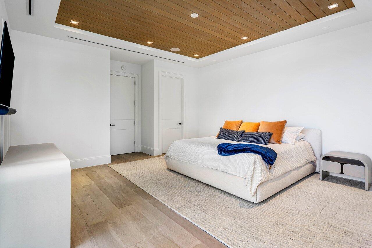 514 Northeast 7th Avenue Delray Beach, FL 33483 - Photo 20 of 51 a bedroom with a bed and window