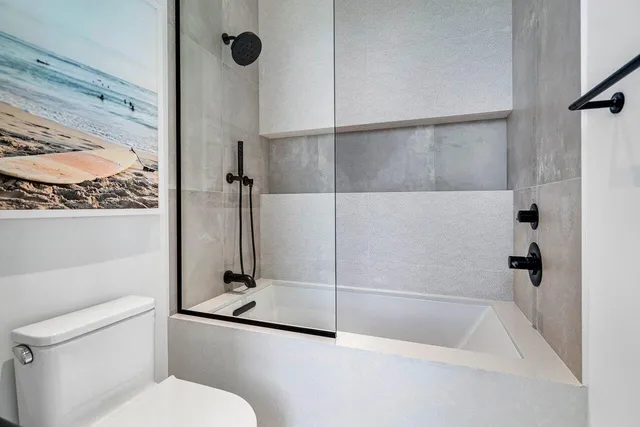 a spacious bathroom with a sink double vanity and a mirror