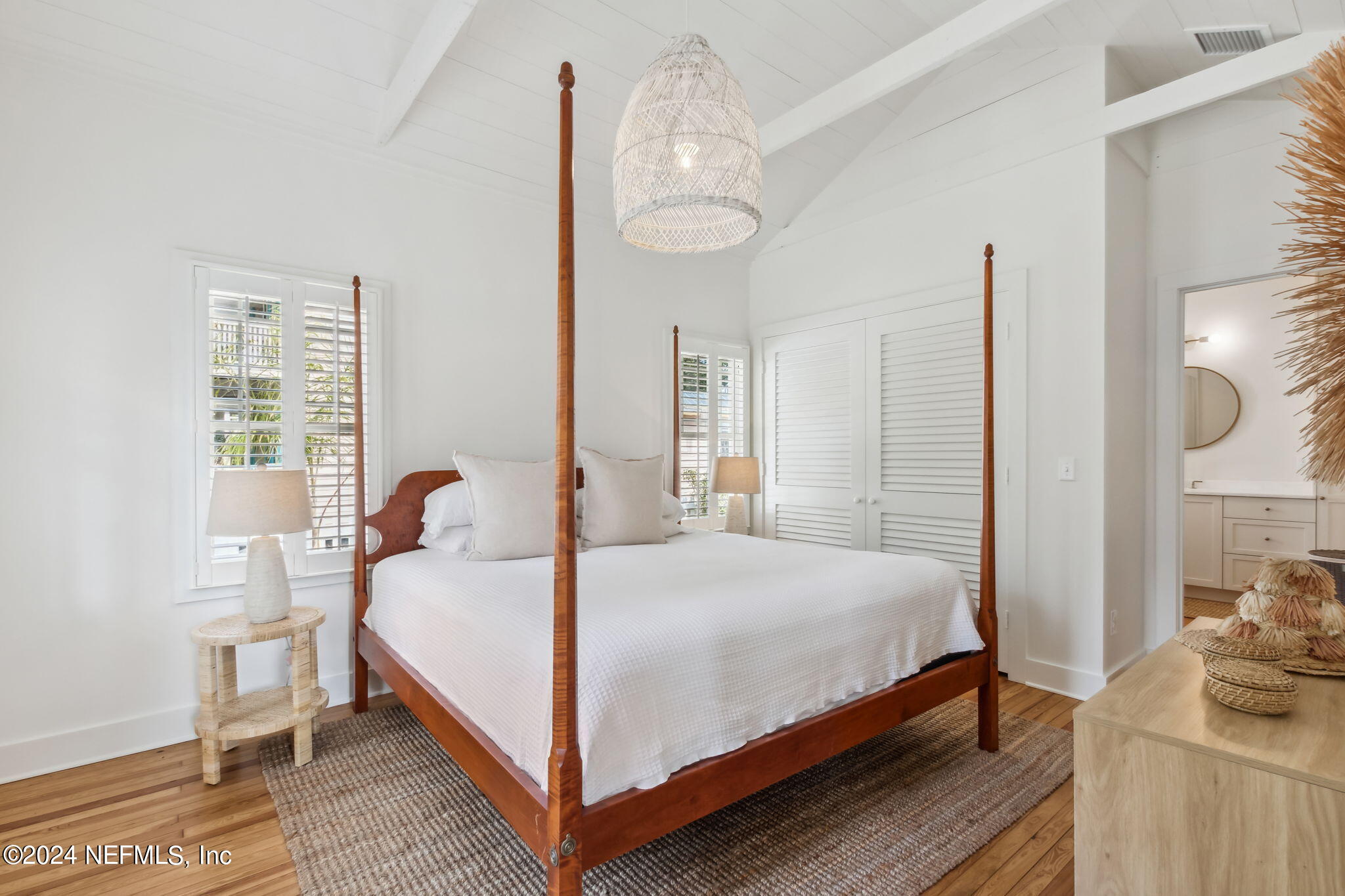 232 South 7th Street Fernandina Beach, FL 32034 - Photo 19 of 43 a bedroom with a bed and window