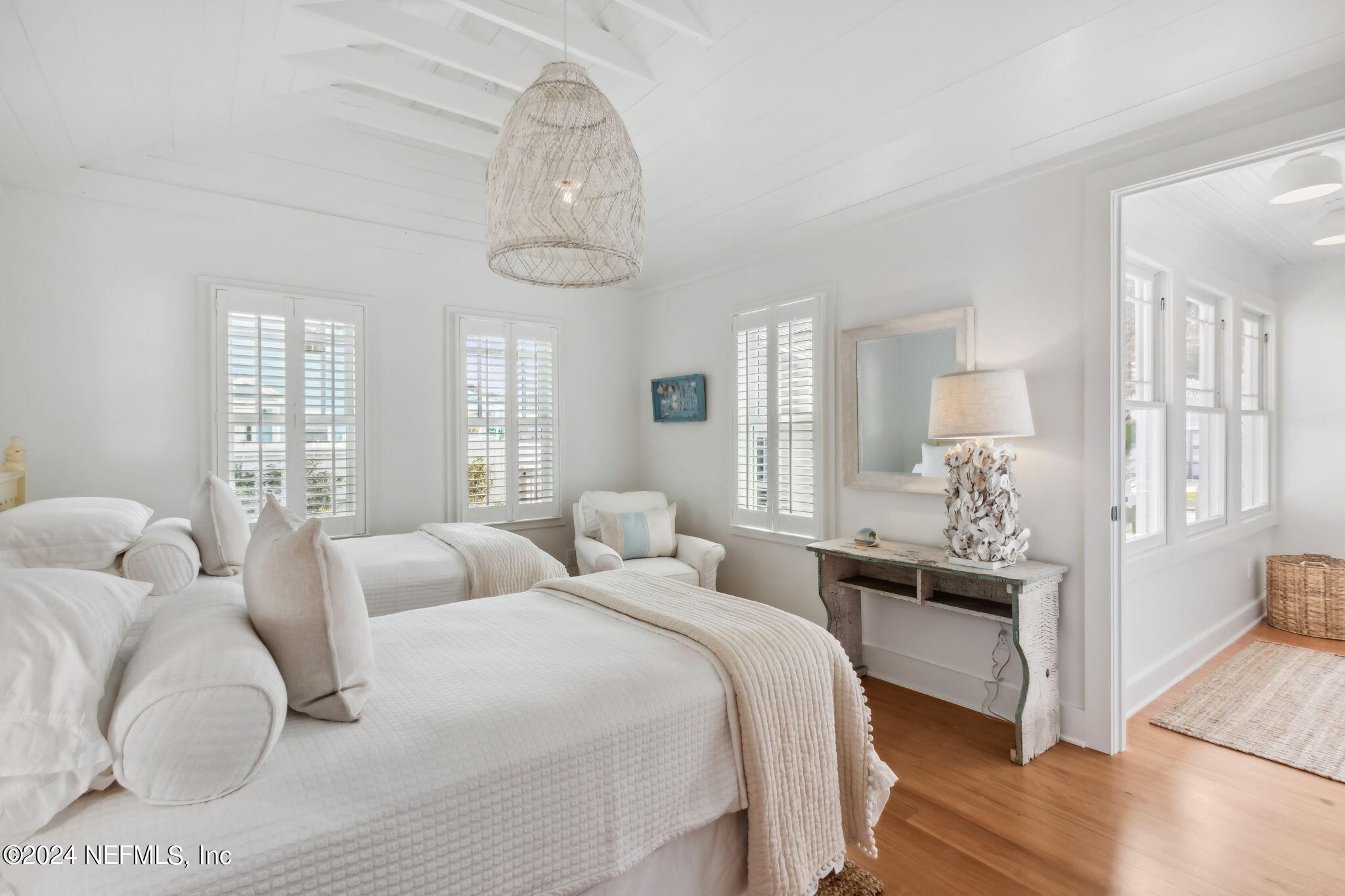 232 South 7th Street Fernandina Beach, FL 32034 - Photo 28 of 43 a bedroom with bed and window