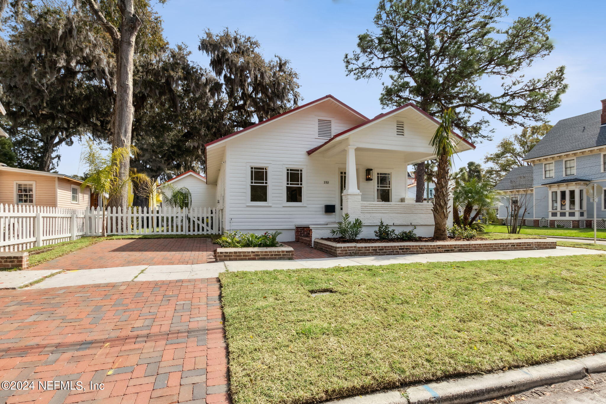 232 South 7th Street Fernandina Beach, FL 32034 - Photo 36 of 43 a front view of a house with swimming pool