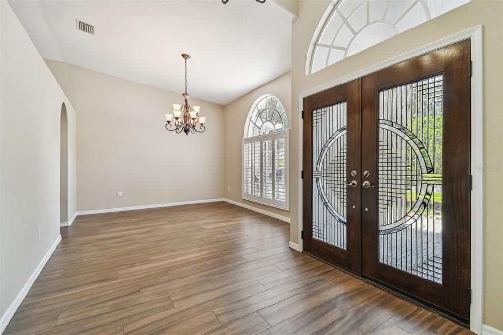 19331 Wind Dancer Street Lutz, FL 33558 - Photo 14 of 92 a view of a room with wooden floor and balcony