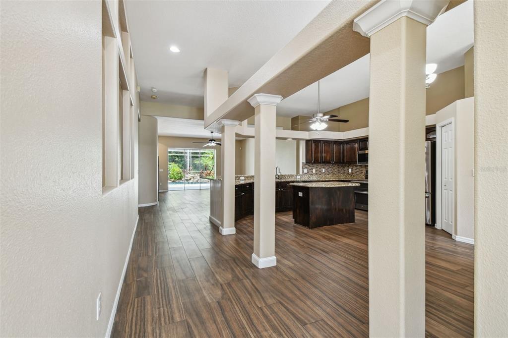 19331 Wind Dancer Street Lutz, FL 33558 - Photo 18 of 92 a view of a kitchen with a sink and a refrigerator