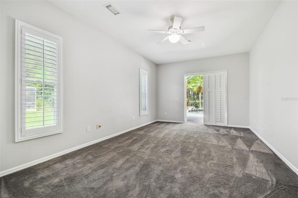 19331 Wind Dancer Street Lutz, FL 33558 - Photo 43 of 92 a view of an empty room with a window