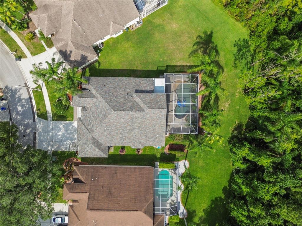 19331 Wind Dancer Street Lutz, FL 33558 - Photo 84 of 92 an aerial view of a house with a yard basket ball court and outdoor seating