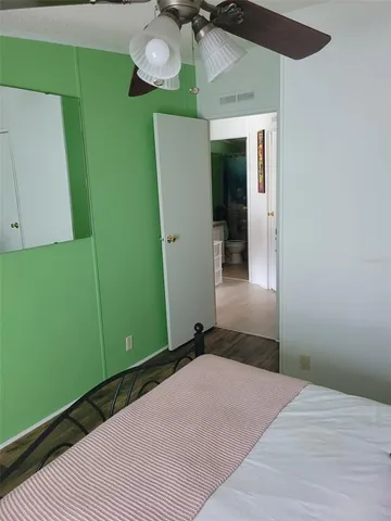 a view of a house with backyard and porch