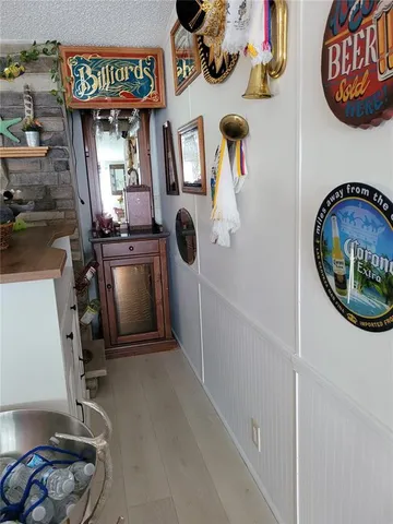 a kitchen with a sink cabinets and window