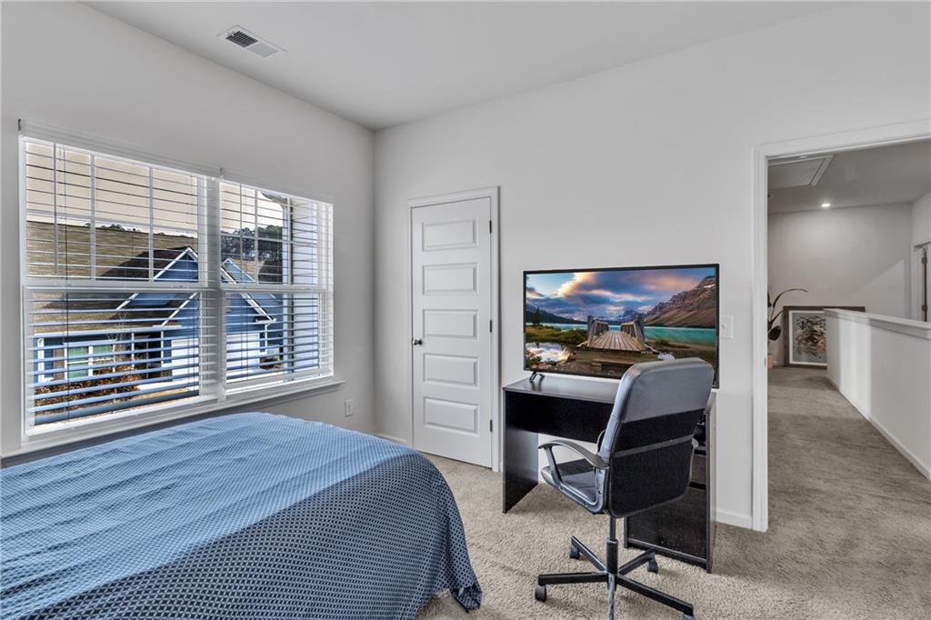 97 Crossroad Circle Jasper, GA 30143 - Photo 18 of 28 a view of a workspace with furniture and a window