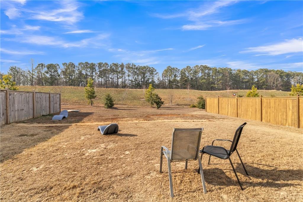 97 Crossroad Circle Jasper, GA 30143 - Photo 23 of 28 a view of swimming pool with outdoor seating and yard in the back