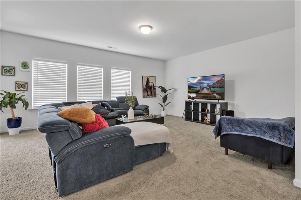97 Crossroad Circle Jasper, GA 30143 - Photo 4 of 28 a living room with furniture and a flat screen tv