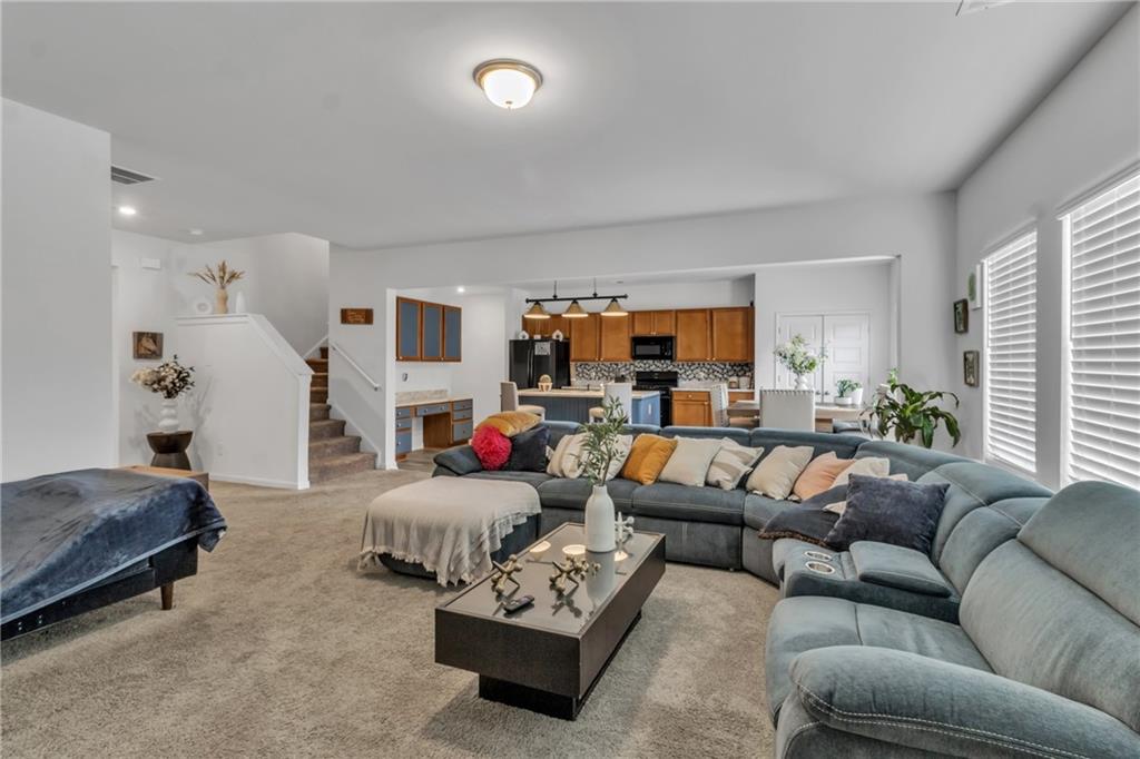 97 Crossroad Circle Jasper, GA 30143 - Photo 5 of 28 a living room with furniture and a window