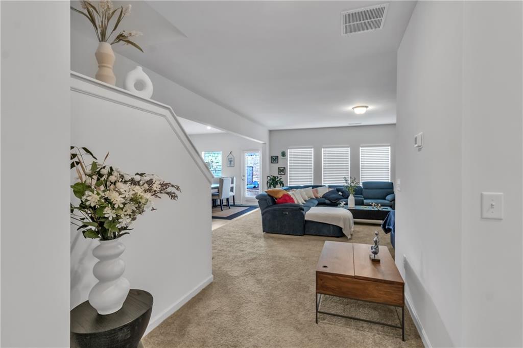 97 Crossroad Circle Jasper, GA 30143 - Photo 8 of 28 a living room with furniture and a potted plant