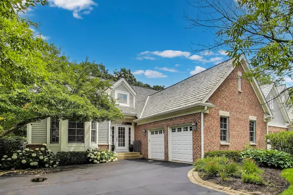 front view of a house with a street