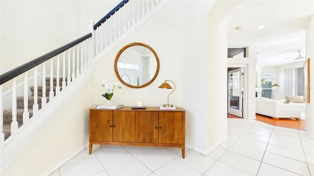 a kitchen with stainless steel appliances a stove a sink and a microwave