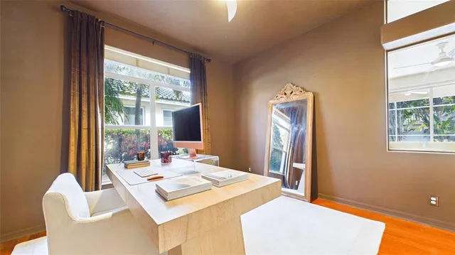 a view of a chairs and table in the patio