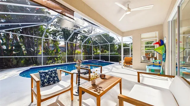 a bedroom with a white bed and white walls
