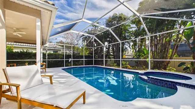 a spacious bathroom with a double vanity sink a mirror and a shower