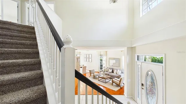 a bathroom with a double vanity sink mirror and bathtub