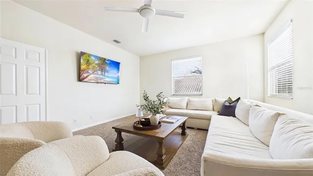 a bed room with a bed and a window