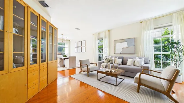 a living room with furniture and a window