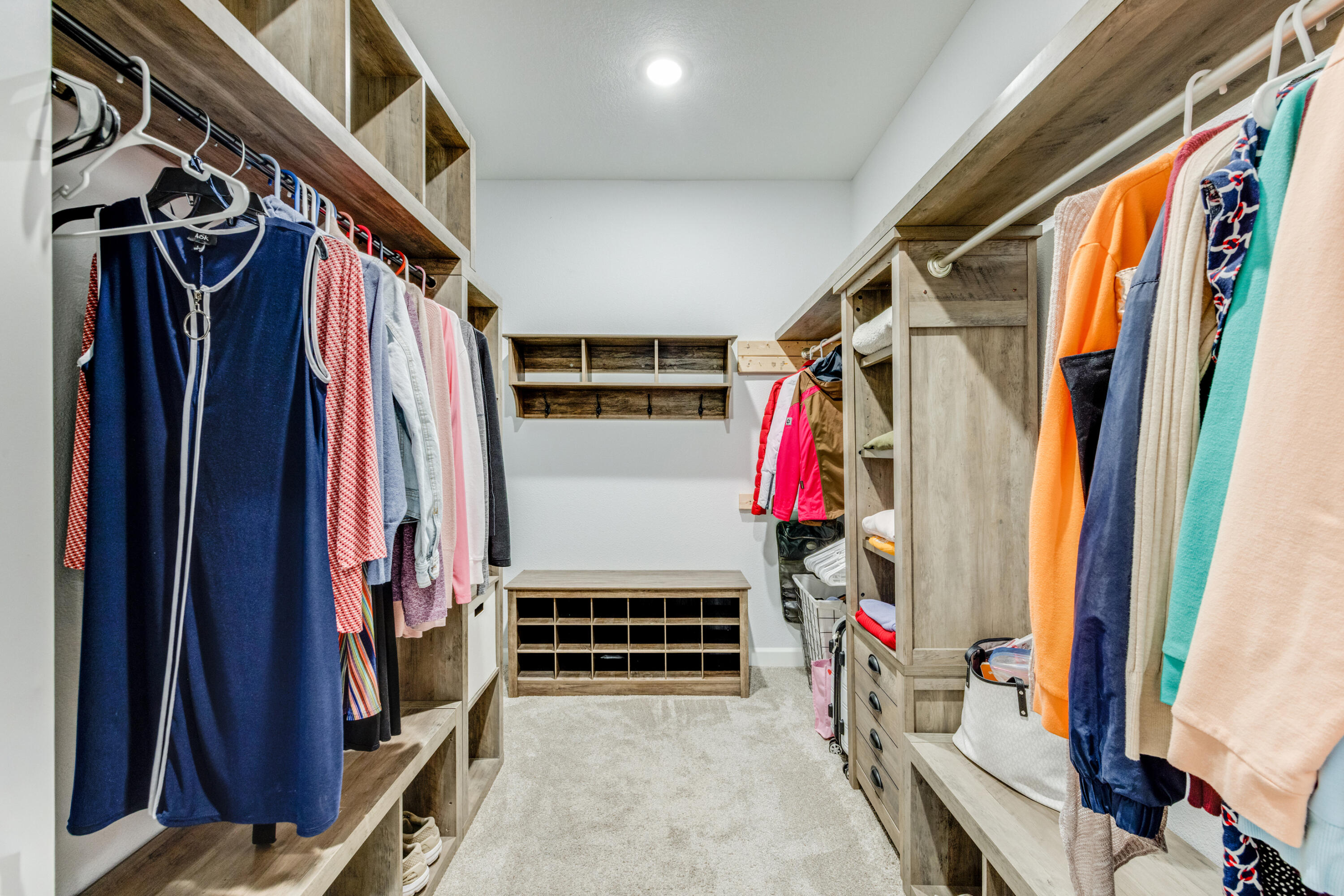 4444 Wilkerson Bluff Road Holt, FL 32564 - Photo 14 of 32 a view of walk in closet with clothes and shoes