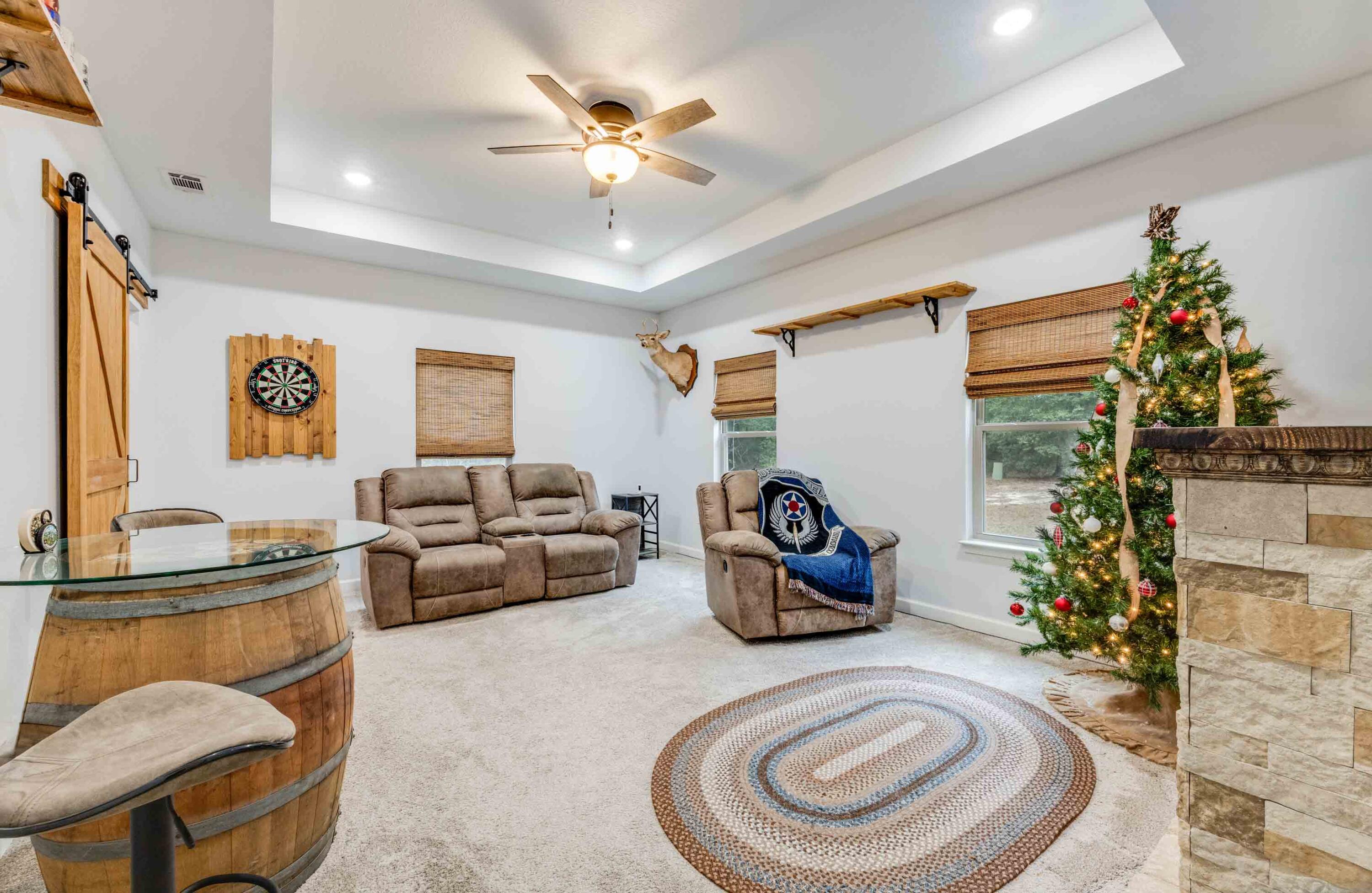 4444 Wilkerson Bluff Road Holt, FL 32564 - Photo 15 of 32 a living room with furniture and a chandelier
