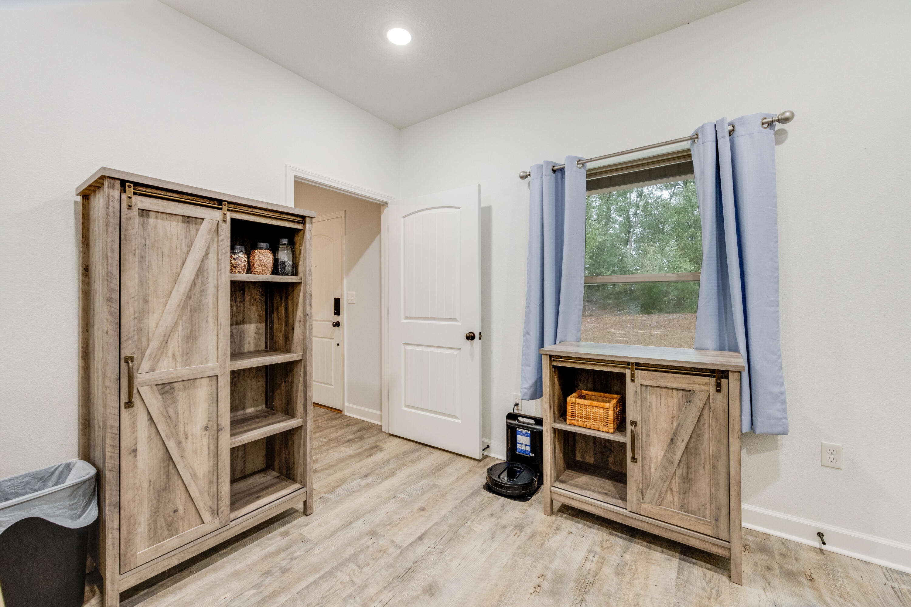 4444 Wilkerson Bluff Road Holt, FL 32564 - Photo 21 of 32 a view of a livingroom with furniture and closet