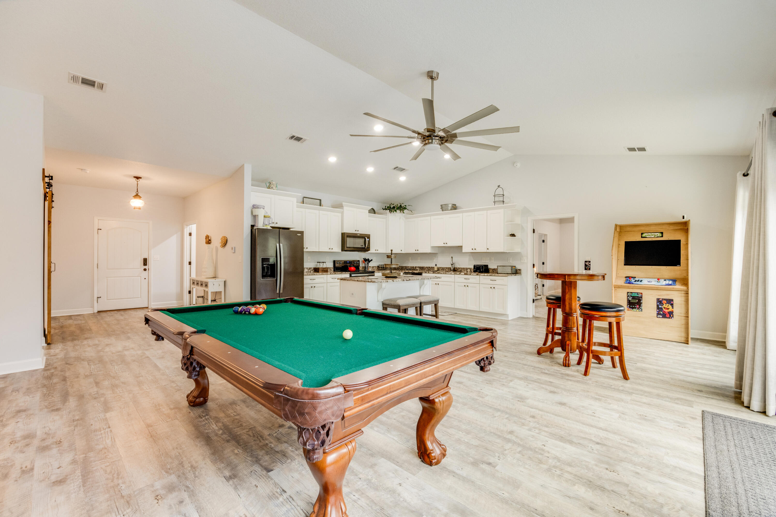 4444 Wilkerson Bluff Road Holt, FL 32564 - Photo 6 of 32 a living room with stainless steel appliances furniture and kitchen view