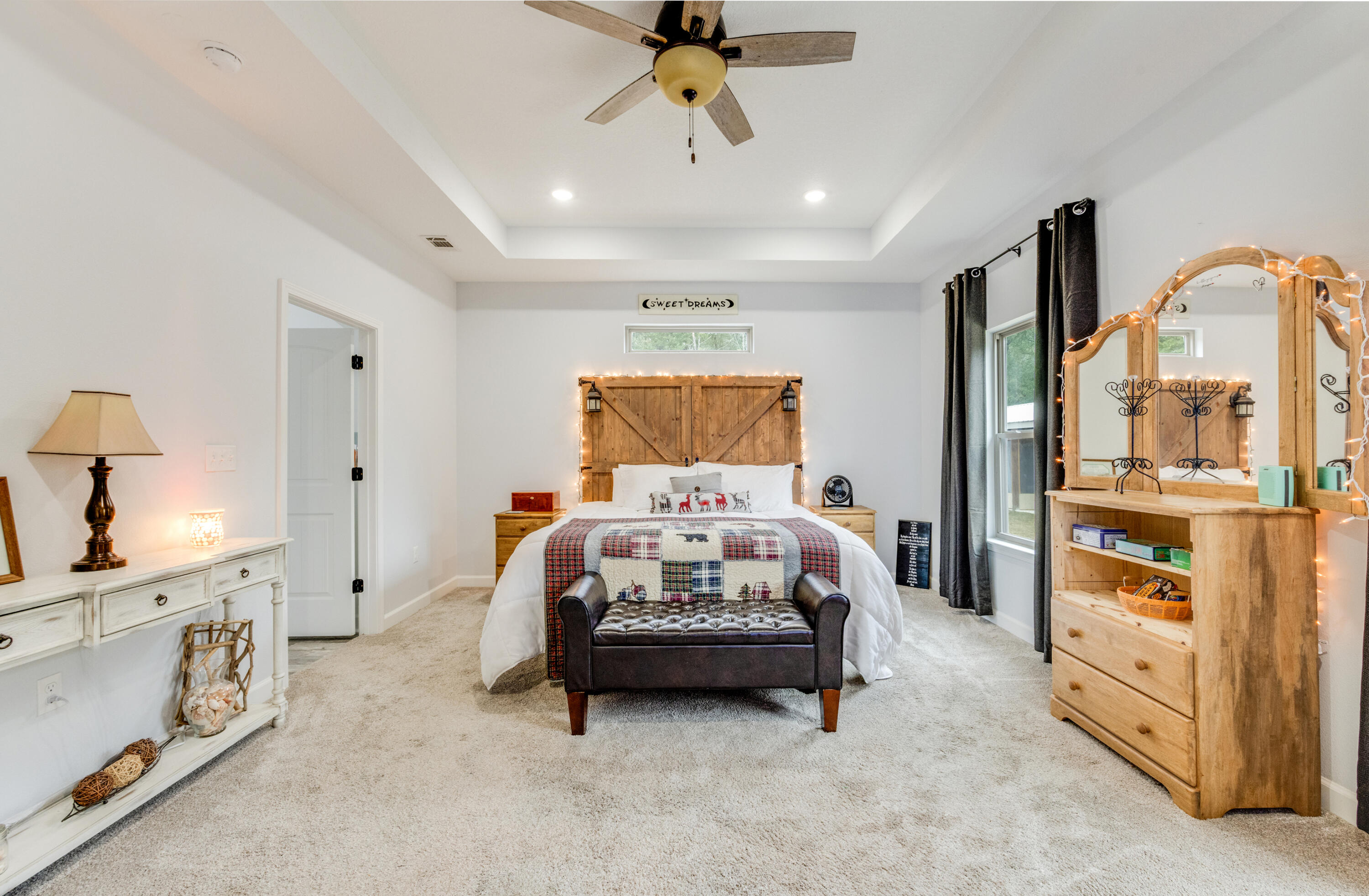 4444 Wilkerson Bluff Road Holt, FL 32564 - Photo 9 of 32 a bedroom with furniture and white walls