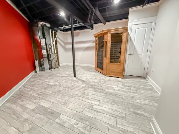 a view of a room with wooden walls