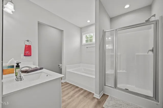 a very nice looking room with a ceiling fan