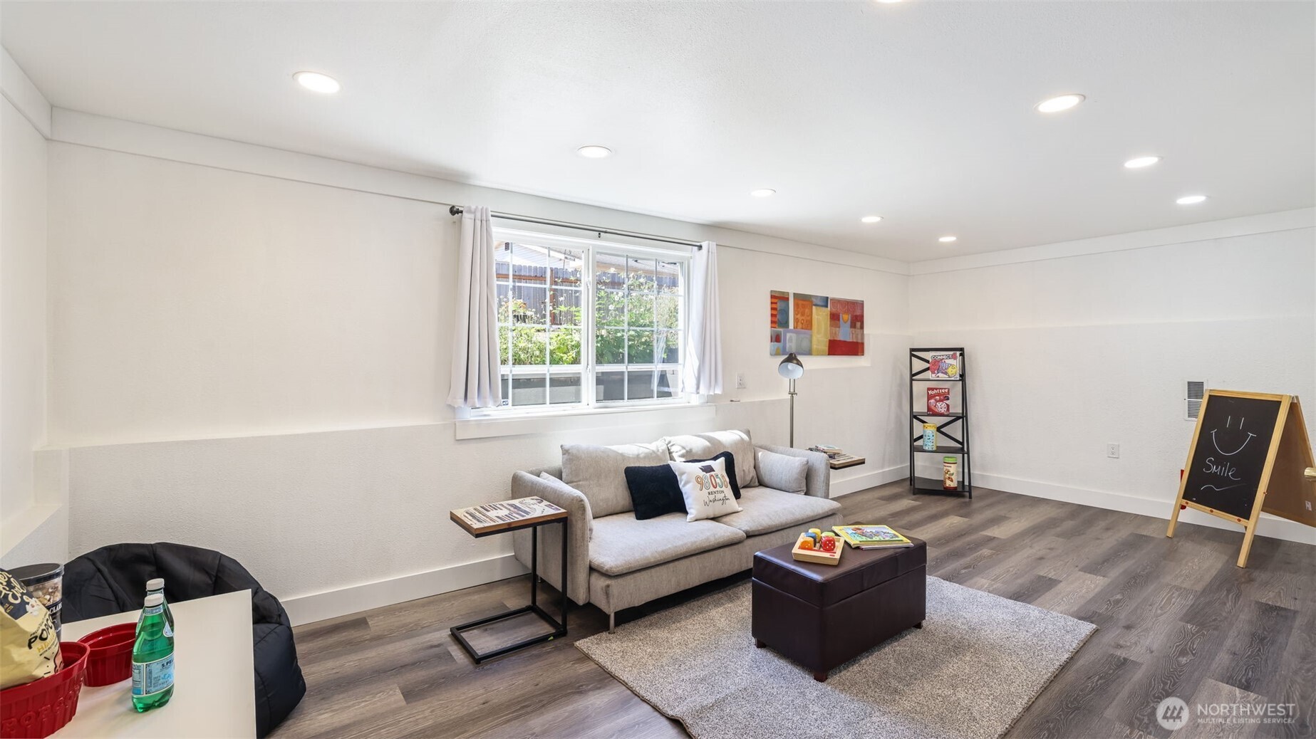 13735 Southeast 172nd Street Renton, WA 98058 - Photo 14 of 29 a living room with furniture and a wooden floor