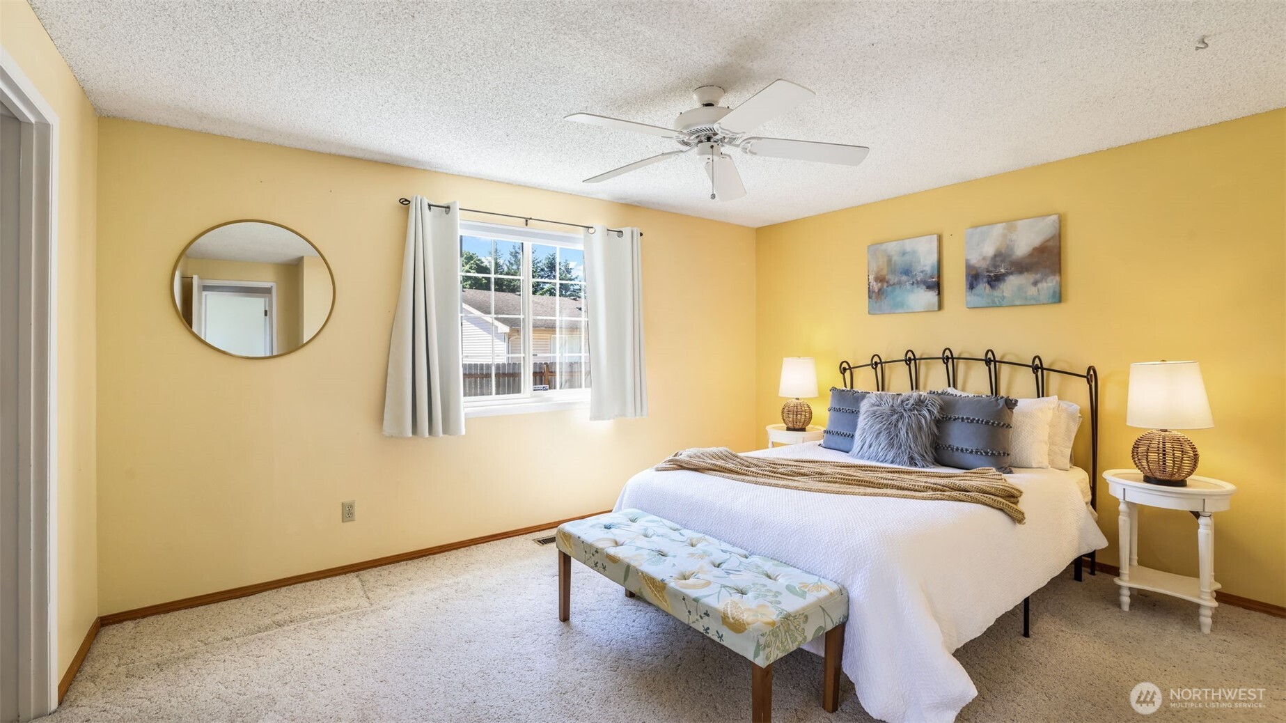 13735 Southeast 172nd Street Renton, WA 98058 - Photo 17 of 29 a bedroom with a bed and lamps