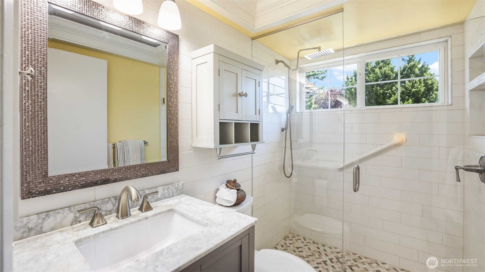 13735 Southeast 172nd Street Renton, WA 98058 - Photo 18 of 29 a bathroom with a granite countertop sink a mirror and shower