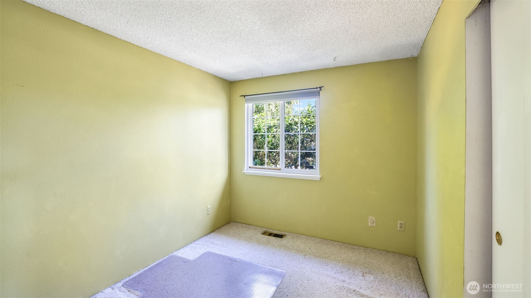 13735 Southeast 172nd Street Renton, WA 98058 - Photo 19 of 29 a view of an empty room with a window