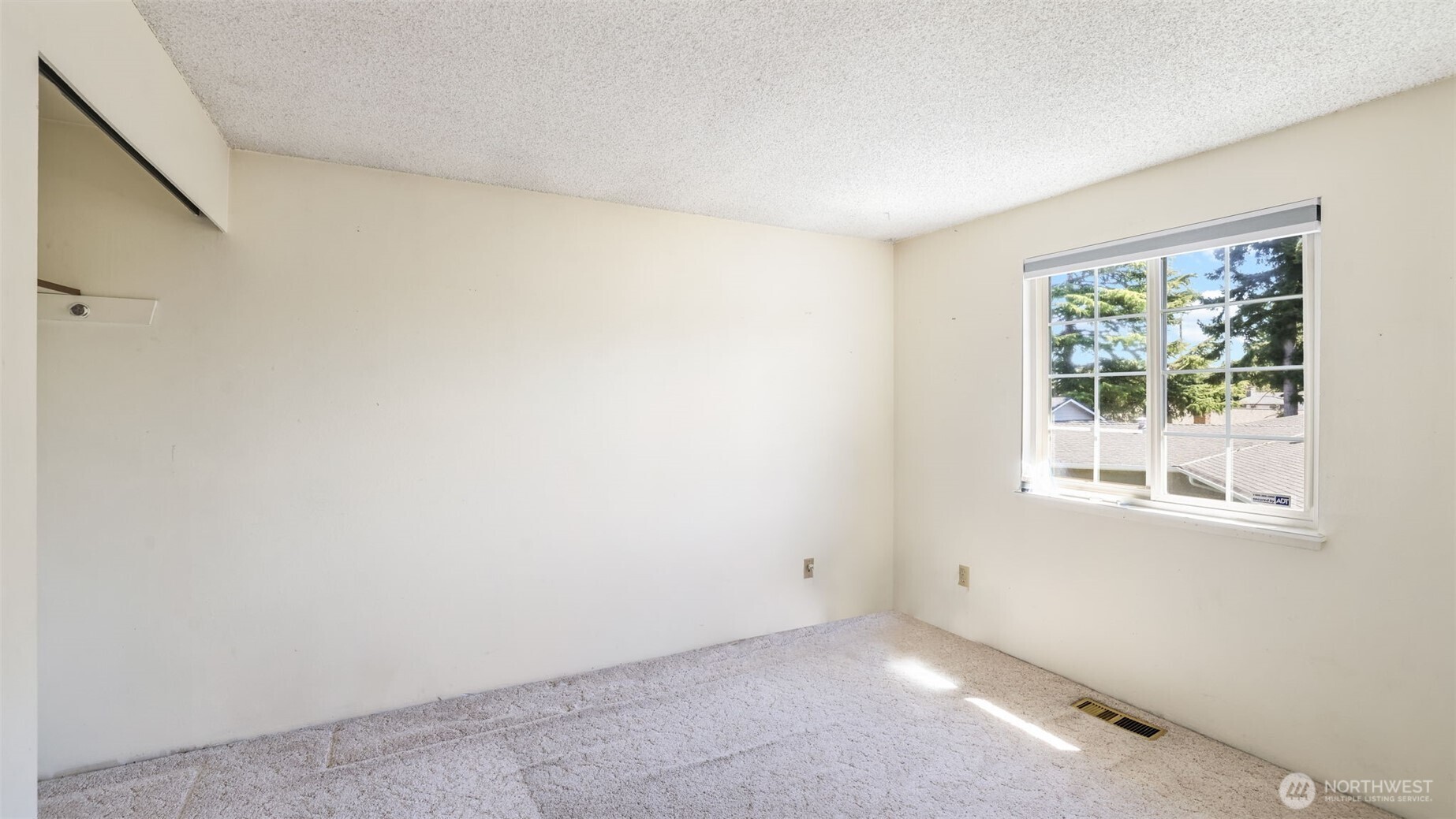 13735 Southeast 172nd Street Renton, WA 98058 - Photo 20 of 29 a view of an empty room with a window