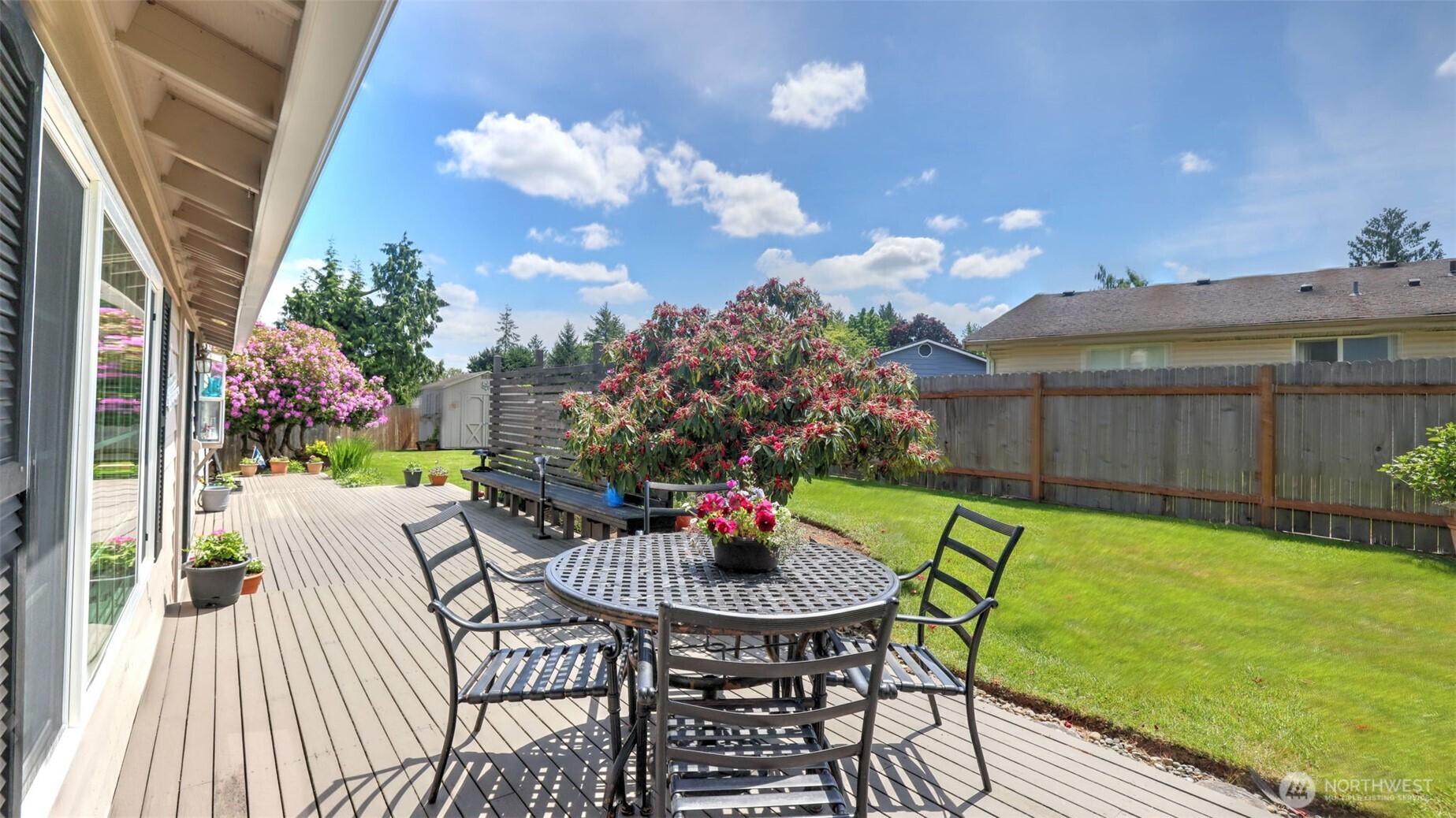 13735 Southeast 172nd Street Renton, WA 98058 - Photo 23 of 29 a view of a house with backyard and furniture