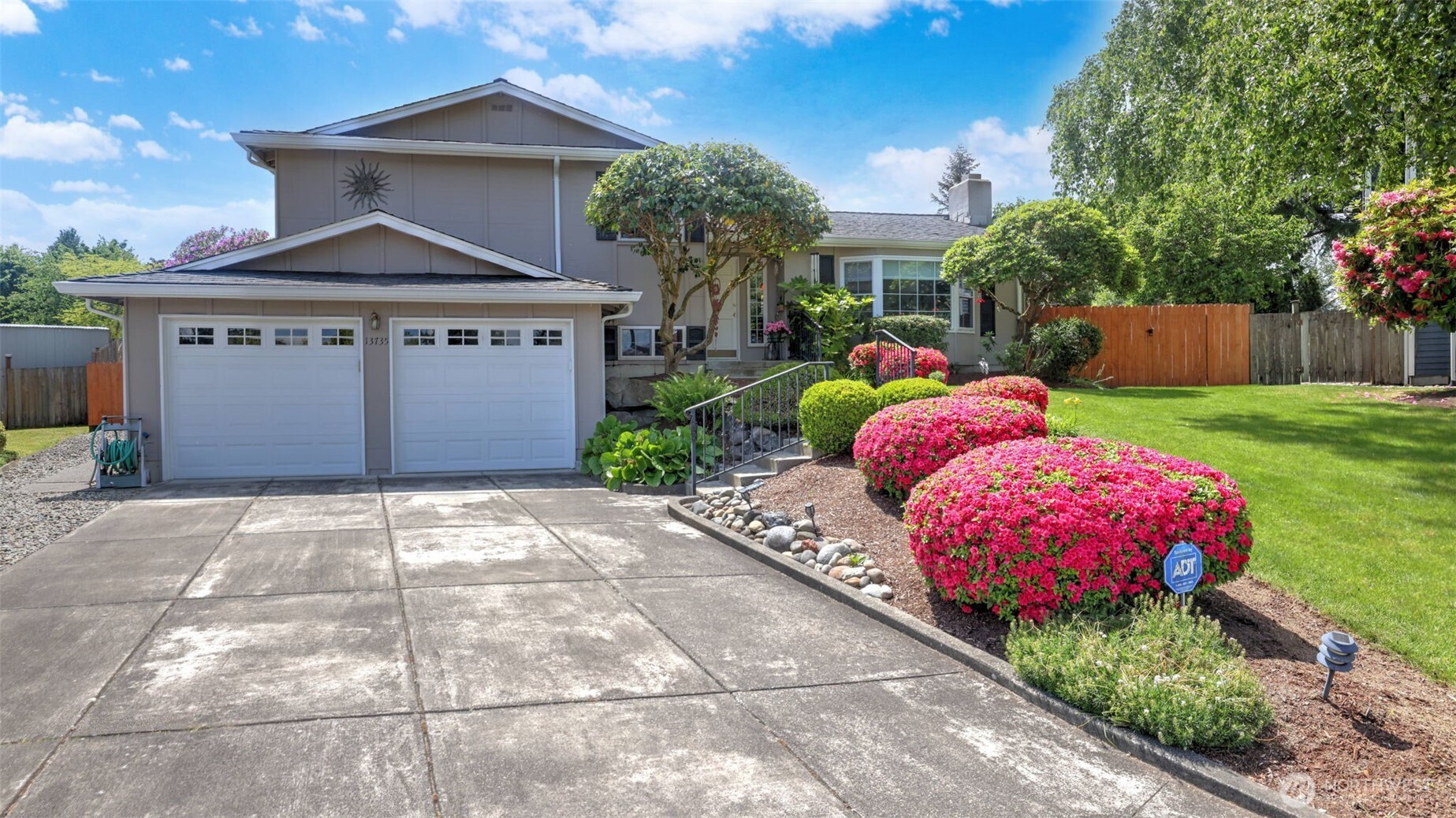 13735 Southeast 172nd Street Renton, WA 98058 - Photo 29 of 29 a front view of a house with garden