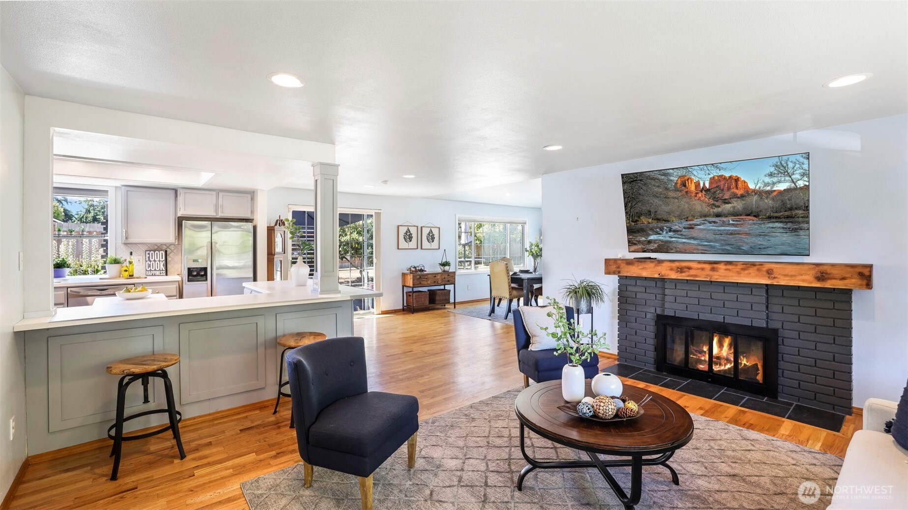 13735 Southeast 172nd Street Renton, WA 98058 - Photo 4 of 29 a living room with furniture and a fireplace
