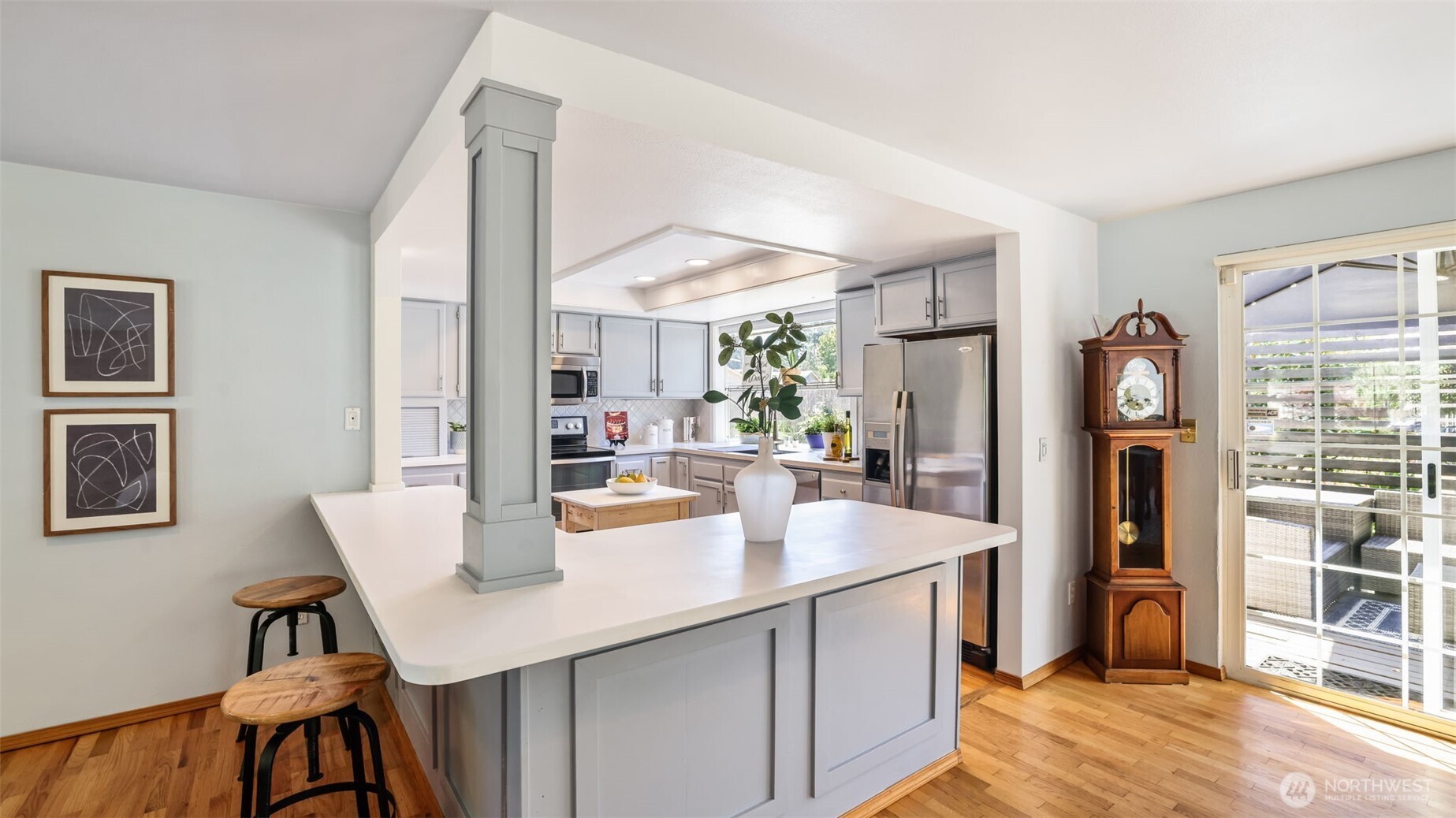 13735 Southeast 172nd Street Renton, WA 98058 - Photo 5 of 29 a kitchen with a sink cabinets and dining table